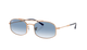 Sunglasses with gold frame and blue gradient lenses on a white background