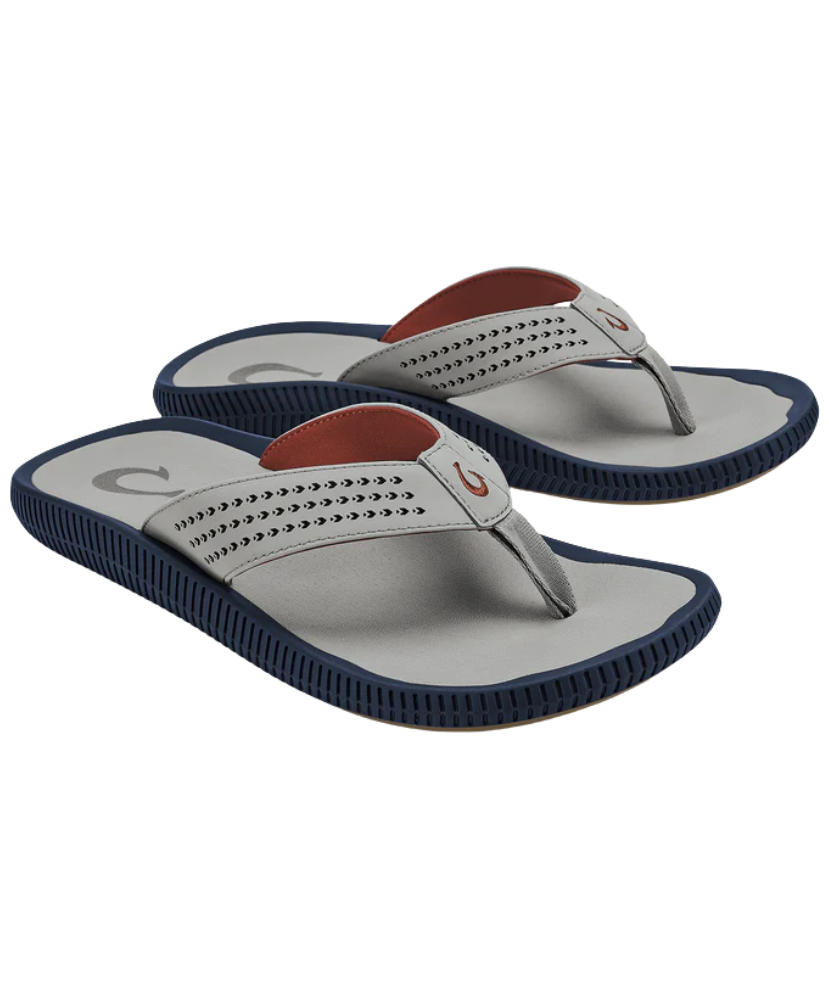 Pair of gray sandals with navy soles and brown insoles on a white background