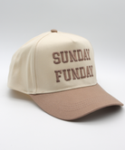 Beige cap with 'SUNDAY FUNDAY' text on a light gray background