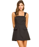Woman wearing a black dress on a white background