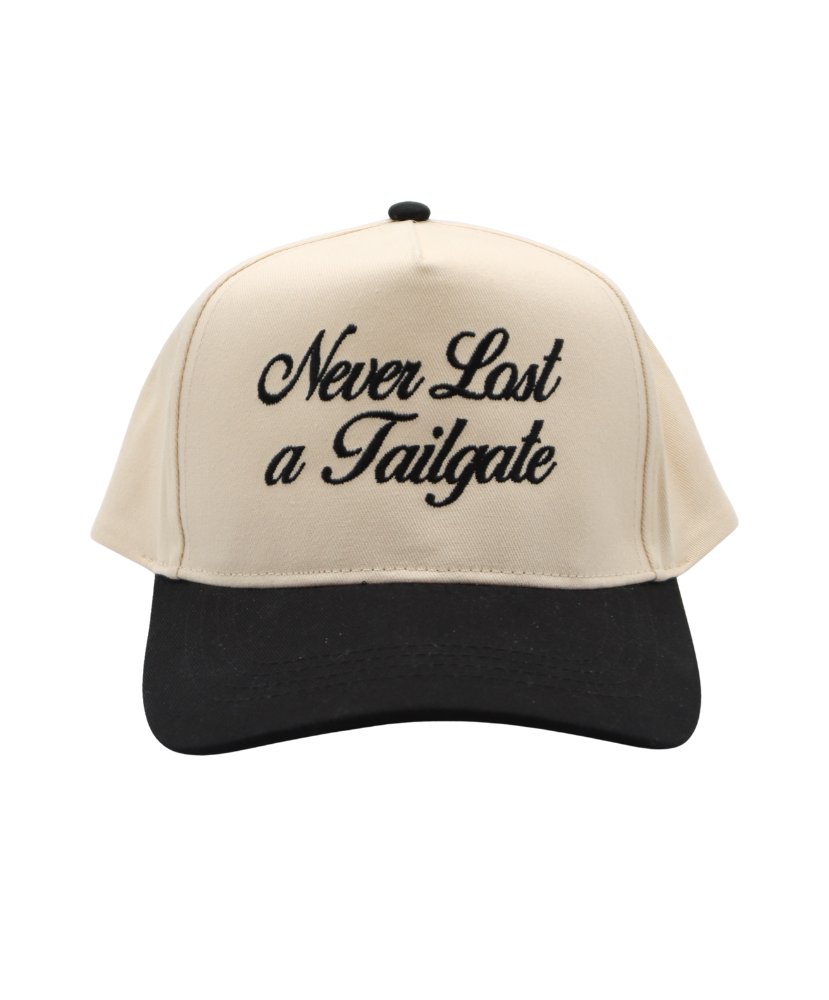 Beige and black cap with 'Never Last a Tailgate' text on a white background