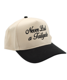 Beige and black cap with 'Never Last a Tailgate' text on a white background