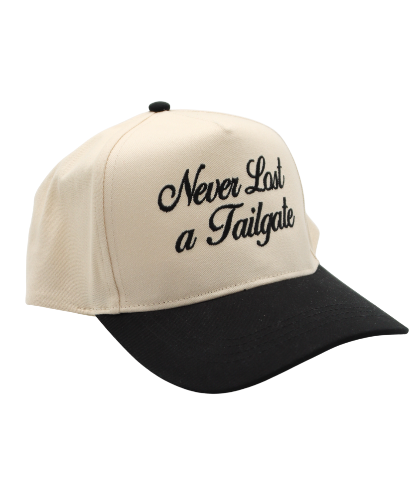 Beige and black cap with 'Never Last a Tailgate' text on a white background