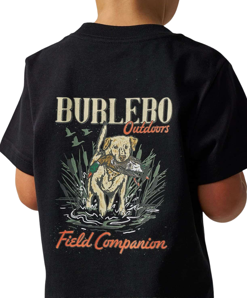 A child wearing a black short-sleeve T-shirt, shown from the back. The shirt features a large graphic print with the words 'BURLEBO Outdoors' and 'Field Companion' in orange and beige lettering, surrounding an illustration of a yellow Labrador retriever holding a fish in a marsh.