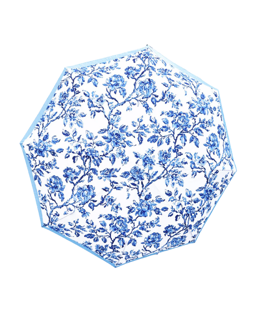 Blue floral patterned umbrella on a white background