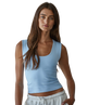 Woman wearing a light blue tank top against a white background