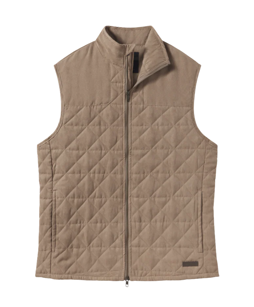 Quilted vest in beige color on a white background