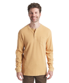 Man wearing a yellow long-sleeve henley shirt on a white background