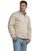 Tan quarter zip pullover with a plaid shirt underneath on a white background