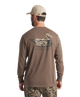 Man wearing a brown long-sleeve shirt with a duck logo on the back, standing against a white background.