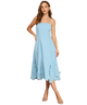 Woman wearing a light blue dress on a white background