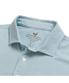 Light blue Beach & Barn polo shirt with a pocket on a white background