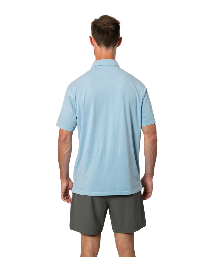 Light blue Beach & Barn polo shirt with a pocket on a white background