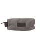 Gray toiletry bag with brown leather patch on a white background