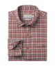 Red and gray plaid shirt with brand labels on a white background