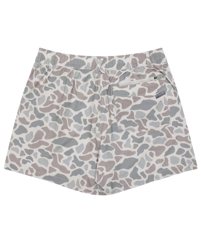 Patterned camoflage shorts with a visible brand logo on a white background