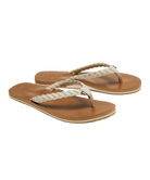 Pair of tan sandals with braided straps on a white background