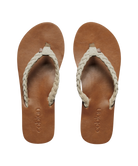 Pair of tan sandals with braided straps on a white background