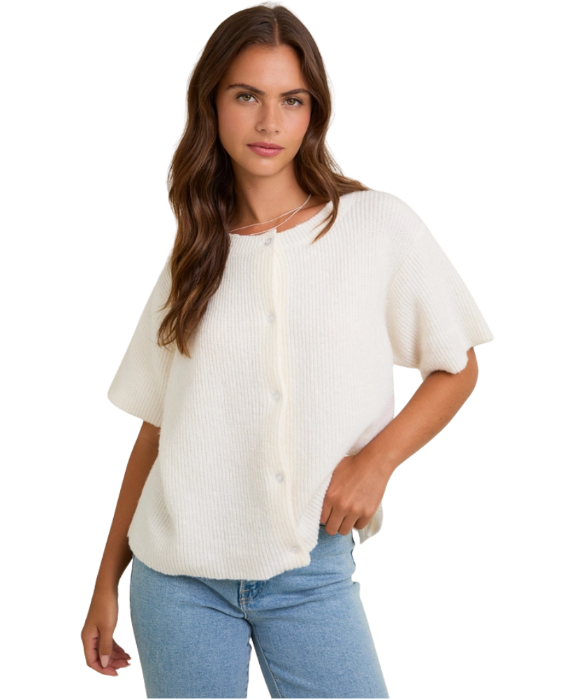 Woman wearing a white blouse and blue jeans on a white background