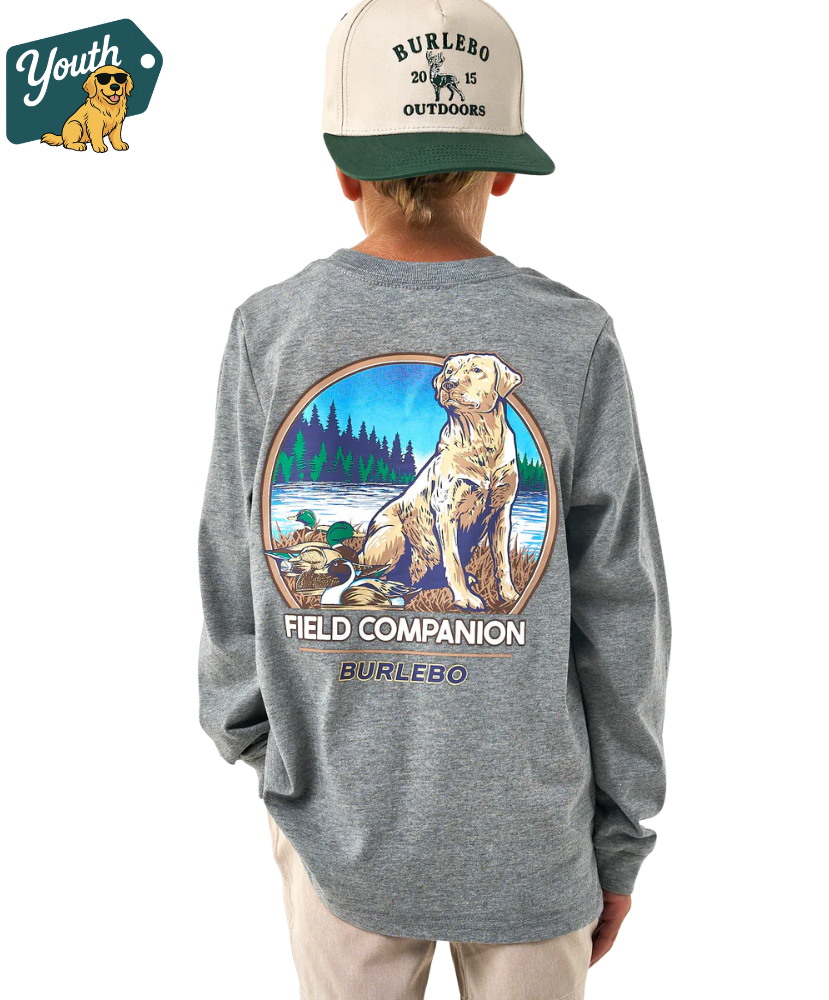 Child wearing a gray long-sleeve shirt with a Burlebo logo and field dog yellow lab companion design, standing against a white background.