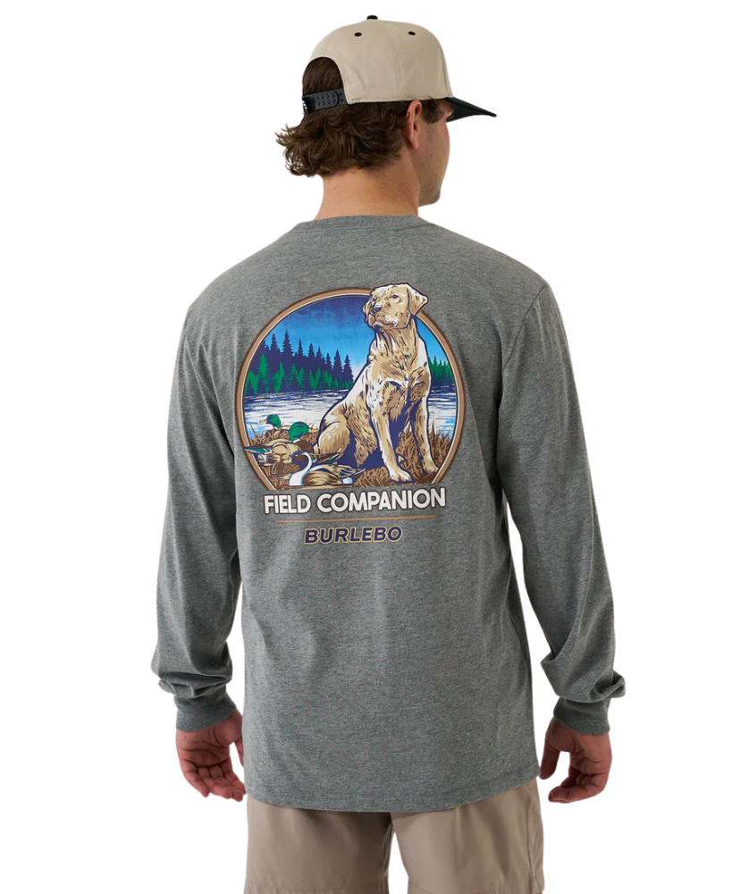 Man wearing a gray long-sleeve shirt with a HUNTING YELLOW LAB graphic and 'Field Companion' text on the back.