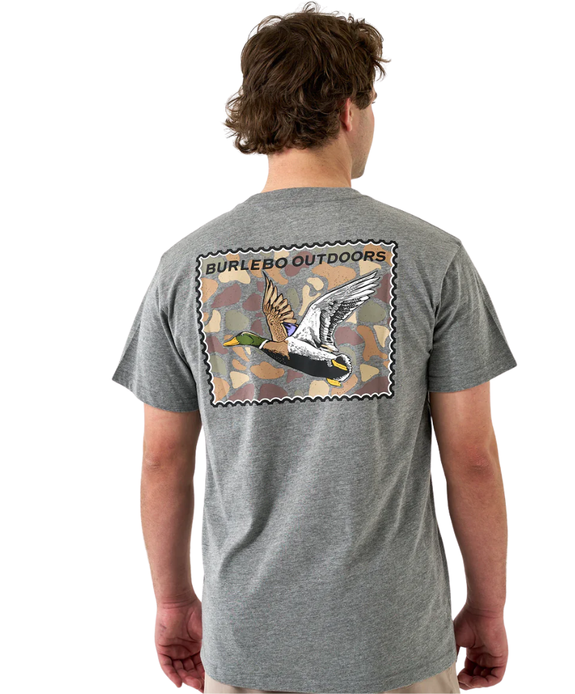 Man wearing a gray t-shirt with a mallard duck design and 'Burlebo Outdoors' branding on the back.