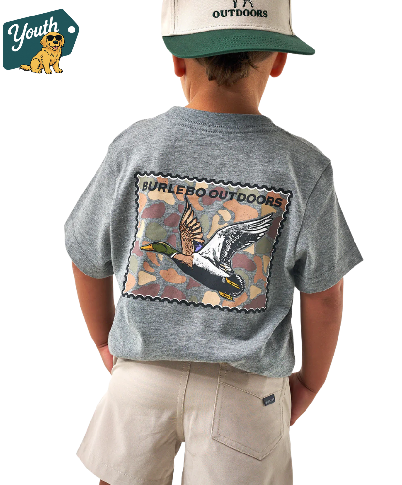 Child wearing a gray t-shirt with a duck stamp design and 'Burlebo Outdoors' branding, standing against a white background.