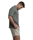 Man wearing a striped shirt and beige shorts on a white background