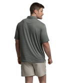 Man wearing a striped polo shirt and beige shorts on a white background