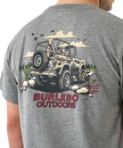 Gray t-shirt with a graphic of a vintage bronco and two dogs, featuring the brand 'Burlebo Outdoors'.