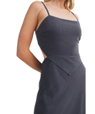 Woman wearing a dark BLUE Scarf Top Dress on a white background