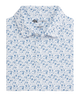 White shirt with blue floral pattern on a white background