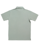 Light green Beach & Barn polo shirt with a pocket on a white background