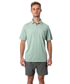 Light green Beach & Barn polo shirt with a pocket on a white background
