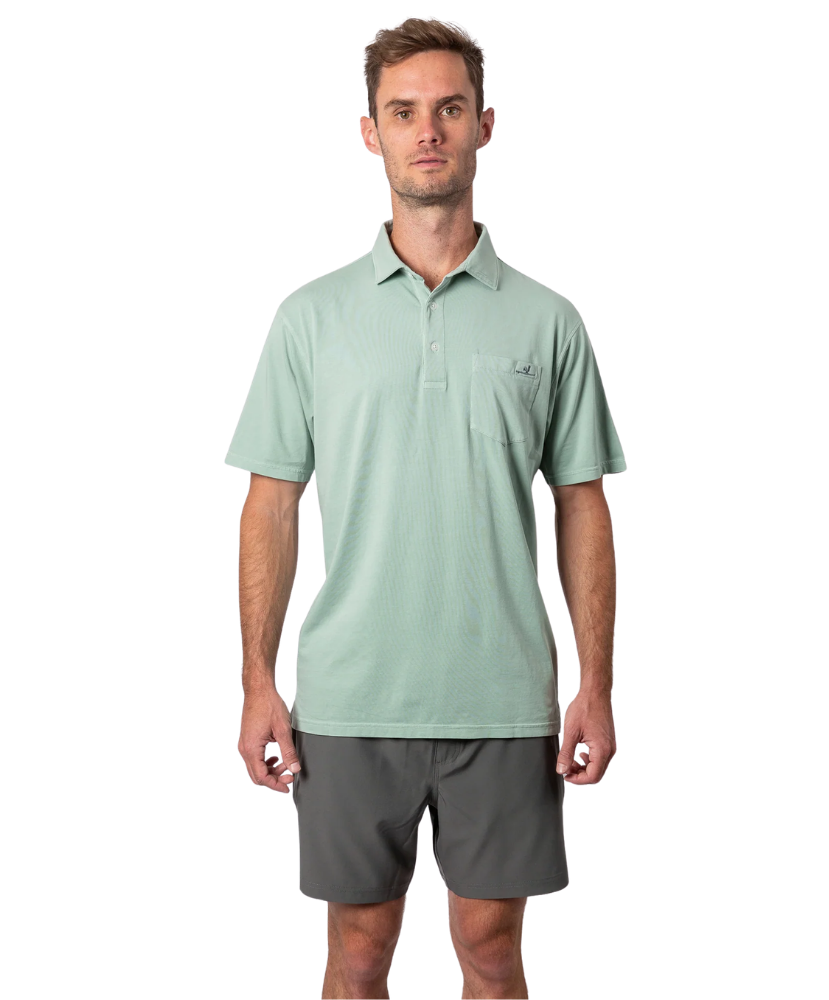 Light green Beach & Barn polo shirt with a pocket on a white background