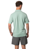 Light green Beach & Barn polo shirt with a pocket on a white background