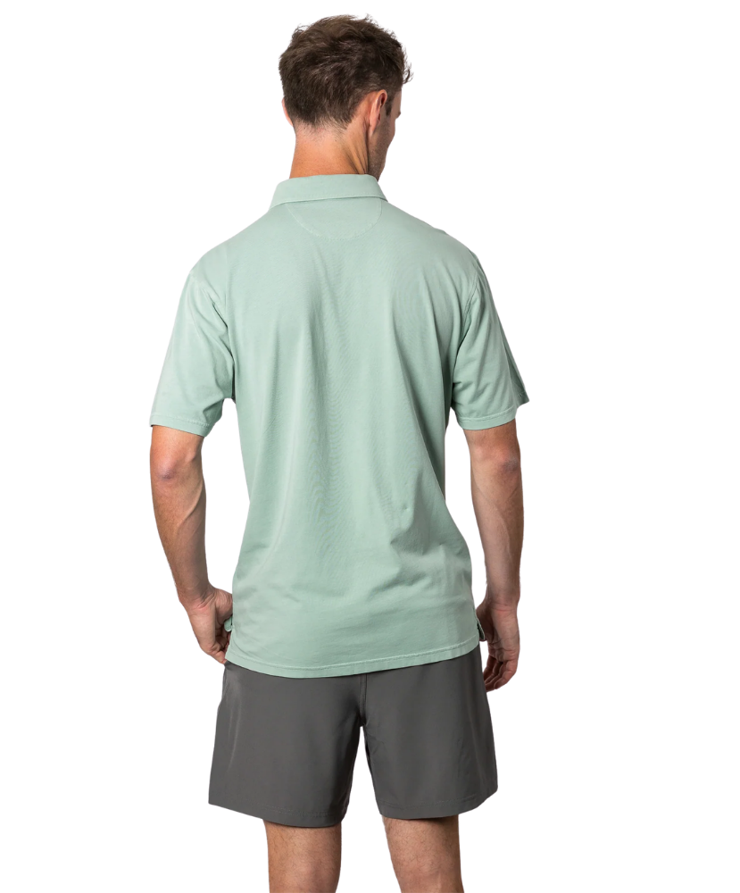 Light green Beach & Barn polo shirt with a pocket on a white background