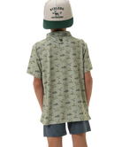 Child wearing a flying duck patterned shirt and cap with 'Burlebo' branding on a white background