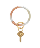 Keychain with a gold key and two-tone rubber band on a white background