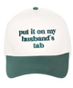 Put It On My Husband's Tab Embroidered Trucker Hat