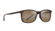 Sunglasses with brown gradient lenses on a white background