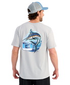 Man wearing a light gray t-shirt with a MARLIN fish graphic and logo on the back, standing against a white background.