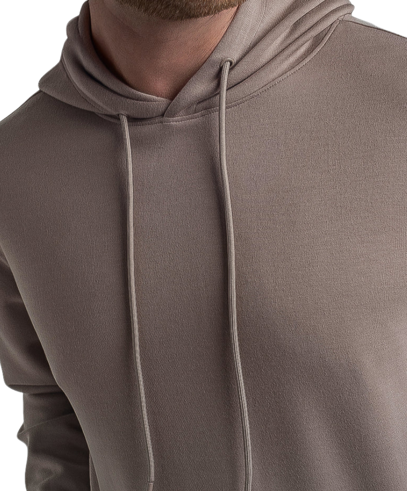 Close-up of a brown hoodie with a neutral background