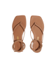 Pair of brown sandals with ankle straps on a white background