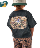 Child wearing a dark gray t-shirt with a colorful duck graphic and text, standing against a white background.