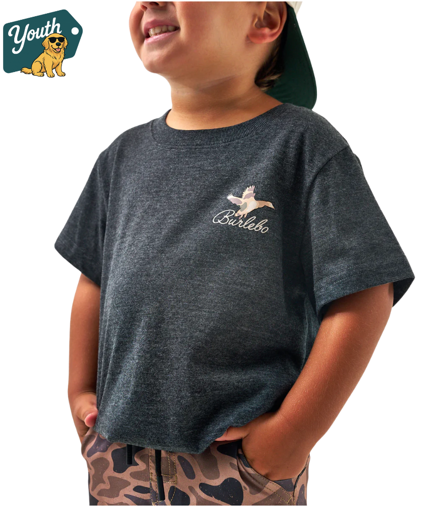 Child wearing a dark gray t-shirt with a duck logo and text, standing against a white background.