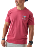 Man wearing a red t-shirt with a logo on a white background