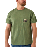 Man wearing a green t-shirt with a pocket design on a white background