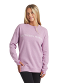 Woman wearing a purple sweatshirt with 'Southern Marsh' logo on a white background