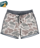 Camouflage kid's swim trunks with gray waistband on a white background, featuring a 'Youth' logo with a dog icon in the corner.